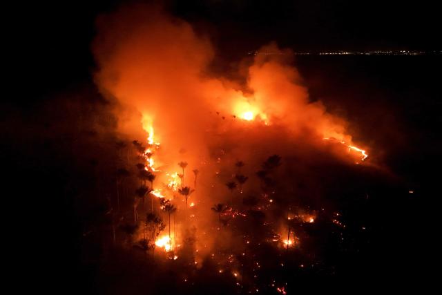 This aerial view shows a wildfire in the Amazon rainforest in Iranduba, Amazonas state, Brazil on September 30, 2026. (Photo by MICHAEL DANTAS / AFP)