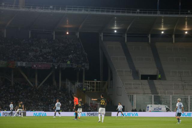 Part of the stands remain empty due to a FIFA sanction imposed on the Argentine Football Association (AFA), which reduced stadium capacity by 50 percent, during the international friendly football match between Argentina and Bolivia at Mario Alberto Kempes Stadium in Cordoba, Argentina, on September 30, 2026. (Photo by DIEGO LIMA / AFP)
