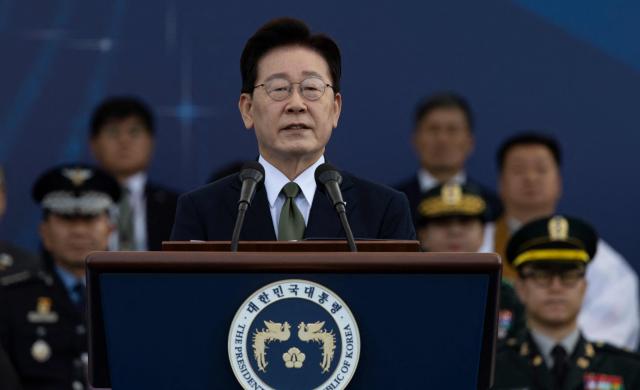 South Korean President Lee Jae Myung delivers a speech during the 78th Armed Forces Day at a military base in Gyeryong on October 1, 2026. (Photo by JEON HEON-KYUN / POOL / AFP)