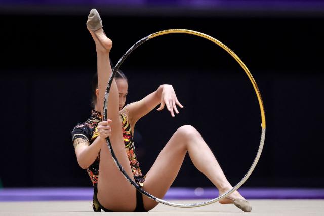 Thailand’s Sitanan Eakbunnasing competes in the individual hoop of the rhythmic gymnastics qualification round during the 2026 Asian Games at the Nagoya General Gymnasium in Nagoya on October 1, 2026. (Photo by DAVID GRAY / AFP)