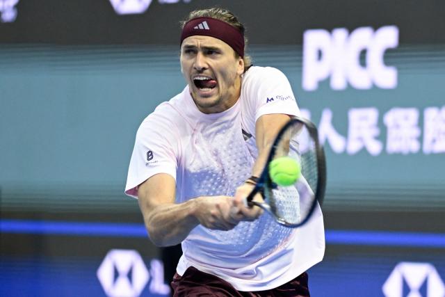Germany's Alexander Zverev hits a return to Britain's Cameron Norrie during their men's singles first round tennis match at the China Open tennis tournament in Beijing on October 1, 2026. (Photo by WANG Zhao / AFP)