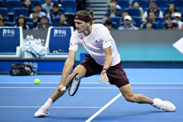 Germany's Alexander Zverev hits a return to Britain's Cameron Norrie during their men's singles first round tennis match at the China Open tennis tournament in Beijing on October 1, 2026. (Photo by WANG Zhao / AFP)