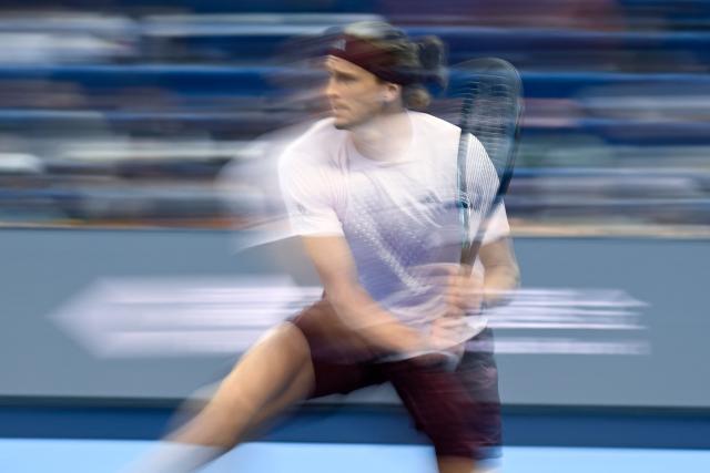 Germany's Alexander Zverev hits a return to Britain's Cameron Norrie during their men's singles first round tennis match at the China Open tennis tournament in Beijing on October 1, 2026. (Photo by WANG Zhao / AFP)