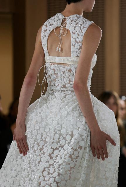 A model presents a creation for Cecilie Bahnsen Women's Spring/Summer 2027 collection fashion show as part of the Paris Fashion Week, in Paris on October 1, 2026. (Photo by Thomas SAMSON / AFP)
