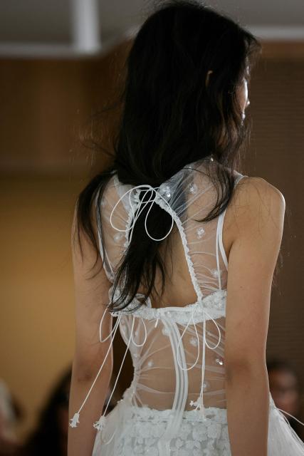 A model presents a creation for Cecilie Bahnsen Women's Spring/Summer 2027 collection fashion show as part of the Paris Fashion Week, in Paris on October 1, 2026. (Photo by Thomas SAMSON / AFP)