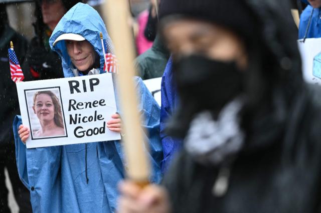 (FILES) Demonstrators protest against US Immigration and Customs Enforcement at Lafayette Square in Washington, DC on January 10, 2026. The family of Renee Good, who was shot dead by an immigration agent during a sweeping federal crackdown earlier this year, sued President Donald Trump's administration on October 1, 2026, alleging wrongful death and civil rights violations. Good, 37, was killed in Minneapolis on January 7 when an Immigration and Customs Enforcement (ICE) agent fired three shots into her car during Operation Metro Surge, the administration's mass deployment in Minnesota. (Photo by Mandel NGAN / AFP)