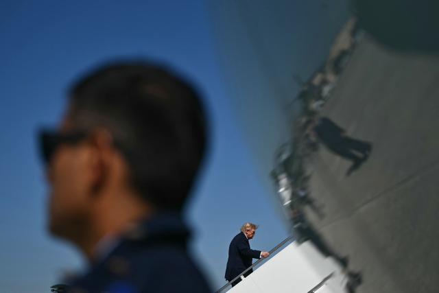 US President Donald Trump boards Air Force One at Joint Base Andrews, Maryland on October 1, 2026. Trump is travelling to Texas and Oklahoma to speak at campaign rallies. (Photo by Kent NISHIMURA / AFP)