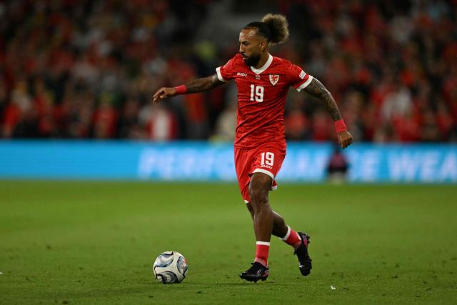 Wales' midfielder Sorba Thomas runs with the ball during the UEFA Nations League, league A, group 4 football match between Wales and Norway, at the Cardiff City Stadium, in Cardiff, on October 1, 2026. (Photo by Glyn KIRK / AFP)