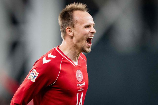 Denmark's midfielder #14 Mikkel Damsgaard celebrates scoring the 1-1 goal with his teammates during the UEFA Nations League Group A4 match between Denmark and Portugal at Parken stadium in Copenhagen on October 1, 2026. (Photo by Sebastian Elias Uth / Ritzau Scanpix / AFP) / Denmark OUT