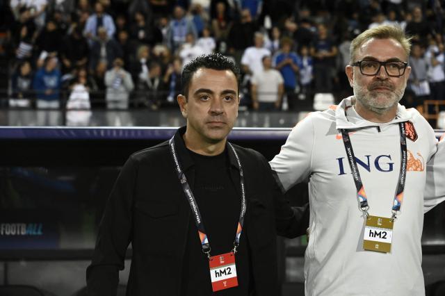 Netherlands' Spanish head coach Xavi Hernandez stands for the anthems ahead of the UEFA Nations League Group A2 football match between Greece and The Netherlands at the Toumba Stadium in Thessaloniki on October 1, 2026. (Photo by Sakis Mitrolidis / AFP)