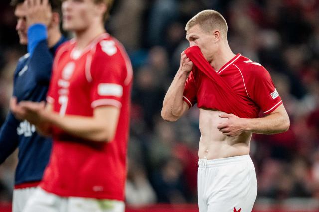 Denmark's defender #13 Rasmus Kristensen reacts at the end of the UEFA Nations League Group A4 match between Denmark and Portugal at Parken stadium in Copenhagen on October 1, 2026. (Photo by Sebastian Elias Uth / Ritzau Scanpix / AFP) / Denmark OUT