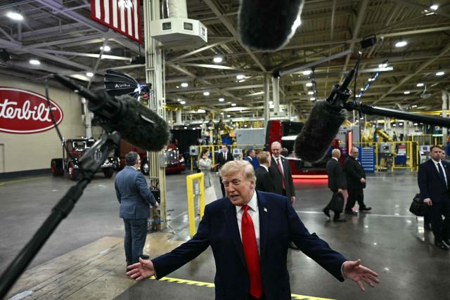 US President Donald Trump speaks to the press at the Peterbilt Motors facility in Denton, Texas, on October 1, 2026. (Photo by Kent NISHIMURA / AFP)