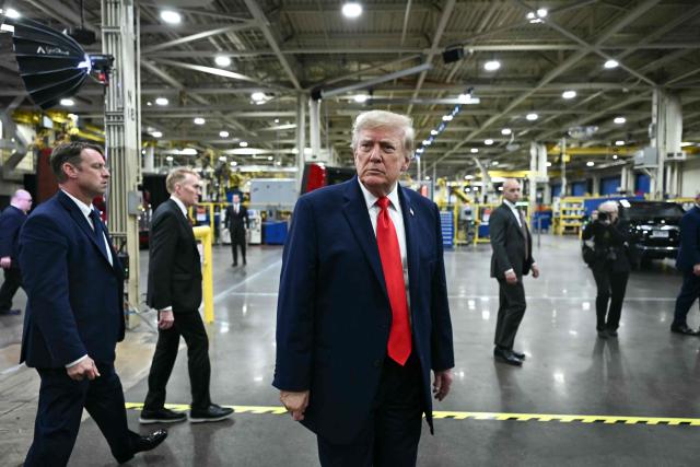 US President Donald Trump takes a question from the press at the Peterbilt Motors facility in Denton, Texas, on October 1, 2026. (Photo by Kent NISHIMURA / AFP)