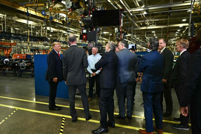 US President Donald Trump speaks as he tours the Peterbilt Motors facility in Denton, Texas, on October 1, 2026. (Photo by Kent NISHIMURA / AFP)