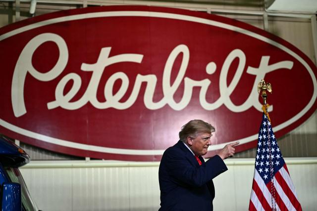 US President Donald Trump arrives to deliver remarks at the Peterbilt Motors facility in Denton, Texas, on October 1, 2026. (Photo by Kent NISHIMURA / AFP)