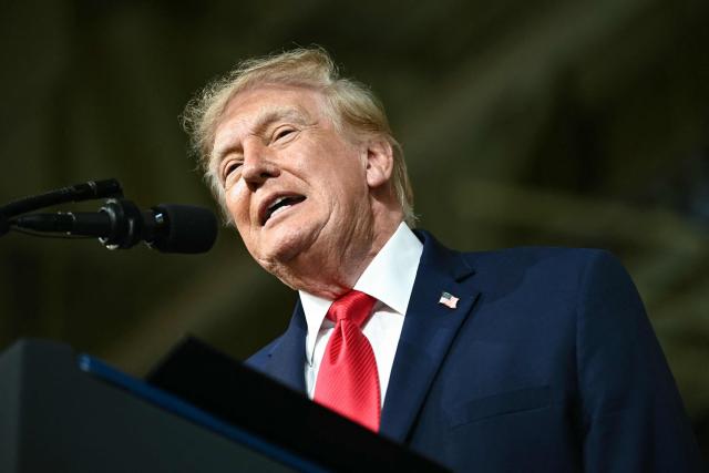 US President Donald Trump delivers remarks at the Peterbilt Motors facility in Denton, Texas, on October 1, 2026. (Photo by Kent NISHIMURA / AFP)