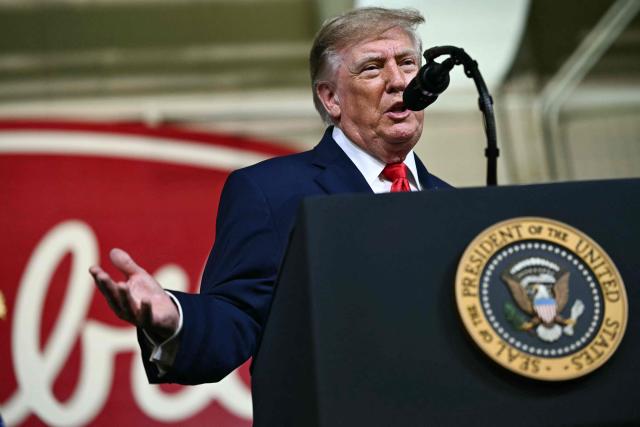 US President Donald Trump delivers remarks at the Peterbilt Motors facility in Denton, Texas, on October 1, 2026. (Photo by Kent NISHIMURA / AFP)