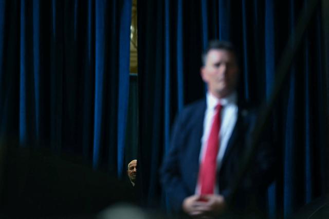 US Commerce Secretary Howard Lutnick looks curtains as he listens to President Donald Trump deliver remarks at the Peterbilt Motors facility in Denton, Texas, on October 1, 2026. (Photo by Kent NISHIMURA / AFP)