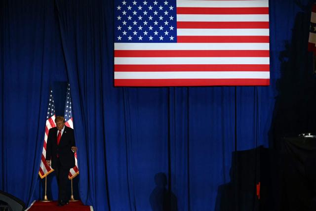 US President Donald Trump arrives to the stage to speaks during a campaign rally at the Choctaw Event Center in Durant, Oklahoma on October 1, 2026. Trump is campaigning for Republican gubernatorial nominee Mike Mazzei. (Photo by Kent NISHIMURA / AFP)