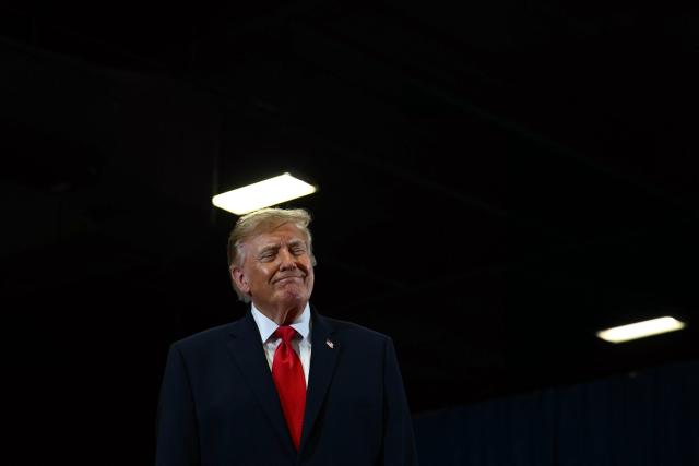 US President Donald Trump reacts while greeting his supporters upon arrival to a campaign rally at the Choctaw Event Center in Durant, Oklahoma on October 1, 2026. Trump is campaigning for Republican gubernatorial nominee Mike Mazzei. (Photo by Kent NISHIMURA / AFP)