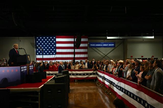 US President Donald Trump speaks during a campaign rally at the Choctaw Event Center in Durant, Oklahoma on October 1, 2026. Trump is campaigning for Republican gubernatorial nominee Mike Mazzei. (Photo by Kent NISHIMURA / AFP)