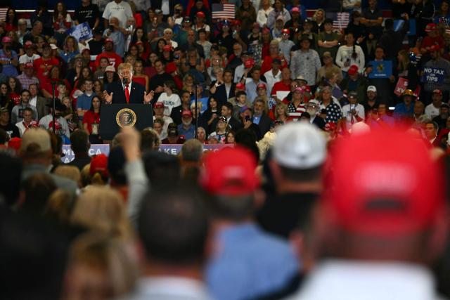US President Donald Trump speaks during a campaign rally at the Choctaw Event Center in Durant, Oklahoma on October 1, 2026. Trump is campaigning for Republican gubernatorial nominee Mike Mazzei. (Photo by Kent NISHIMURA / AFP)