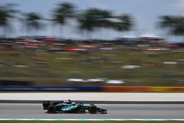 Mercedes' Italian driver Kimi Antonelli steers his car during the first practice session ahead of the Formula One Bahrain Grand Prix in Sepang on October 2, 2026. (Photo by JADE GAO / AFP)