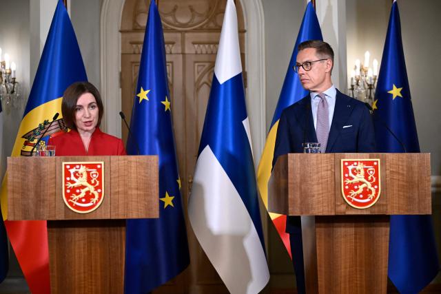 Finnish President Alexander Stubb (R) and Moldovan President Maia Sandu address a press conference at the Presidential Palace in Helsinki, Finland, on October 2, 2026. President Sandu pays a working visit to Finland. (Photo by Mikko Stig / Lehtikuva / AFP) / Finland OUT