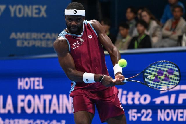 USA's Frances Tiafoe hits a return to France's Arthur Fils during their men's singles match at the ATP Tour Japan Open Tennis Championships at the Ariake Tennis Forest Park in Tokyo on October 2, 2026. (Photo by Rie KIKUCHI / AFP)