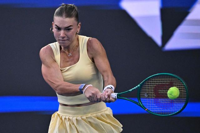 Uzbekistan's Maria Timofeeva hits a return to Japan's Naomi Osaka during their women's singles match at the China Open tennis tournament in Beijing on October 2, 2026. (Photo by Pedro PARDO / AFP)