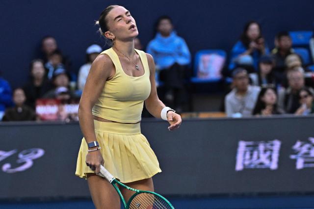 Uzbekistan's Maria Timofeeva reacts during her women's singles match against Japan's Naomi Osaka at the China Open tennis tournament in Beijing on October 2, 2026. (Photo by Pedro PARDO / AFP)