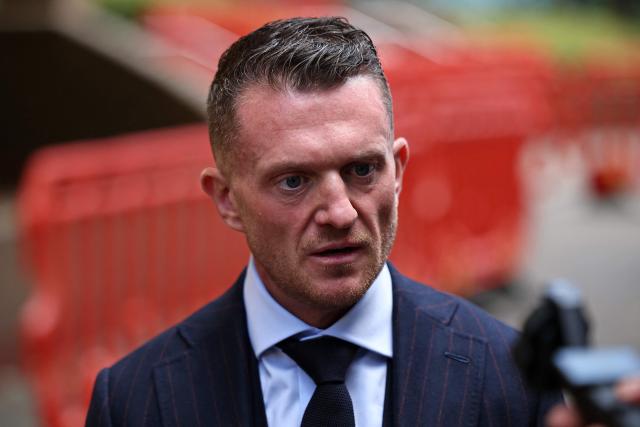 British far-right activist Tommy Robinson, real name Stephen Yaxley-Lennon, reacts as he leaves Southwark Crown Court in London on October 2, 2026, after attending a pre-trial hearing. (Photo by Henry Nicholls / AFP)