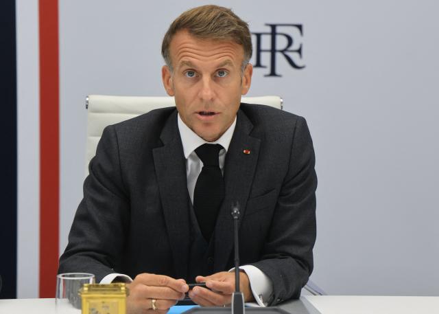 French President Emmanuel Macron speaks following a videoconference with G7 leaders from the Élysée Presidential Palace in Paris on October 2, 2026. G7 leaders were holding talks on October 2, 2026, to coordinate action on tackling high fuel prices, after Washington upped pressure on Europe to release its strategic reserves or face a US diesel export ban. (Photo by Ludovic MARIN / POOL / AFP)