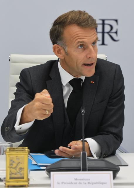 French President Emmanuel Macron speaks following a videoconference with G7 leaders from the Élysée Presidential Palace in Paris on October 2, 2026. G7 leaders were holding talks on October 2, 2026, to coordinate action on tackling high fuel prices, after Washington upped pressure on Europe to release its strategic reserves or face a US diesel export ban. (Photo by Ludovic MARIN / POOL / AFP)