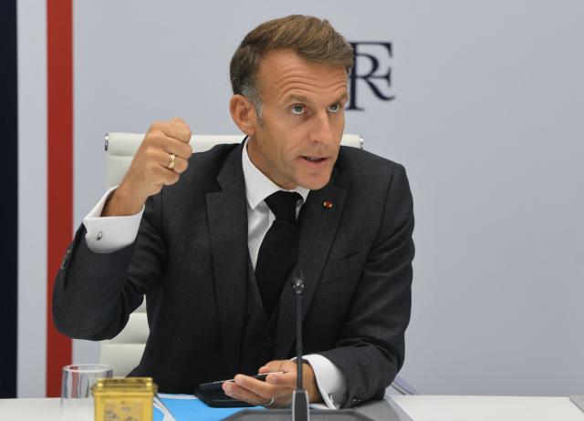French President Emmanuel Macron speaks following a videoconference with G7 leaders from the Élysée Presidential Palace in Paris on October 2, 2026. G7 leaders were holding talks on October 2, 2026, to coordinate action on tackling high fuel prices, after Washington upped pressure on Europe to release its strategic reserves or face a US diesel export ban. (Photo by Ludovic MARIN / POOL / AFP)