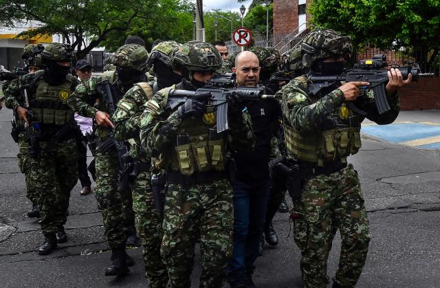 Members of the Colombian Army take part in an anti-terrorism drill simulating a hostage-taking and rescue operation at the Palace of Justice in Cucuta, Colombia on October 2, 2026. (Photo by Schneyder Mendoza / AFP)