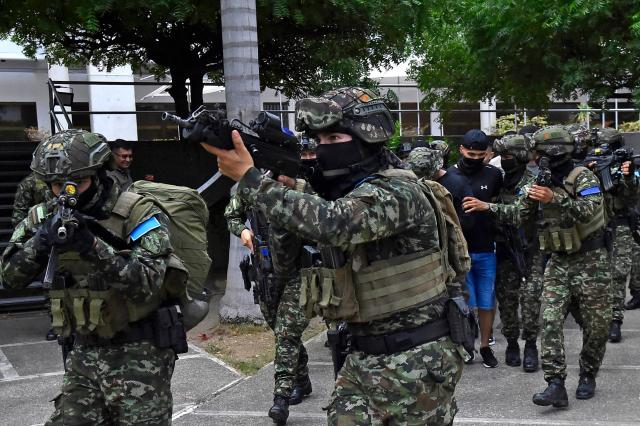 Members of the Colombian Army take part in an anti-terrorism drill simulating a hostage-taking and rescue operation at the Palace of Justice in Cucuta, Colombia on October 2, 2026. (Photo by Schneyder Mendoza / AFP)