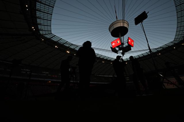 TV brodcasters set up an outdoor pitch-side studio prior to the UEFA Nations League Group B4 football match between Poland and Romania at the National Stadium in Warsaw on October 2, 2026. (Photo by Sergei GAPON / AFP)