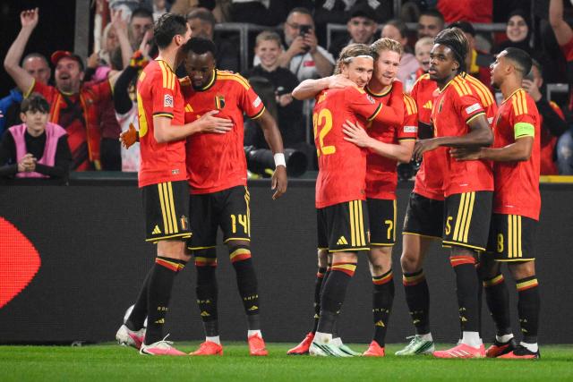 Belgium's midfielder #07 Kevin De Bruyne (C) celebrates with teammates after scoring his team first goal during the UEFA Nations League, League A - Group 1, football match between Belgium and Turkey at the Maurice Dufrasne stadium, in Liege, eastern Belgium on October 2, 2026. (Photo by JOHN THYS / AFP)