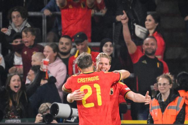 Belgium's midfielder #07 Kevin De Bruyne (rear) celebrates with Belgium's defender #21 Timothy Castagne after scoring his team first goal during the UEFA Nations League, League A - Group 1, football match between Belgium and Turkey at the Maurice Dufrasne stadium, in Liege, eastern Belgium on October 2, 2026. (Photo by JOHN THYS / AFP)