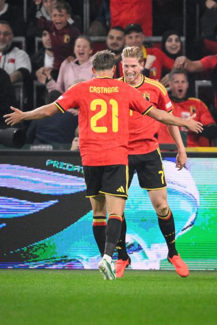 Belgium's midfielder #07 Kevin De Bruyne (rear) celebrates with Belgium's defender #21 Timothy Castagne after scoring his team first goal during the UEFA Nations League, League A - Group 1, football match between Belgium and Turkey at the Maurice Dufrasne stadium, in Liege, eastern Belgium on October 2, 2026. (Photo by JOHN THYS / AFP)