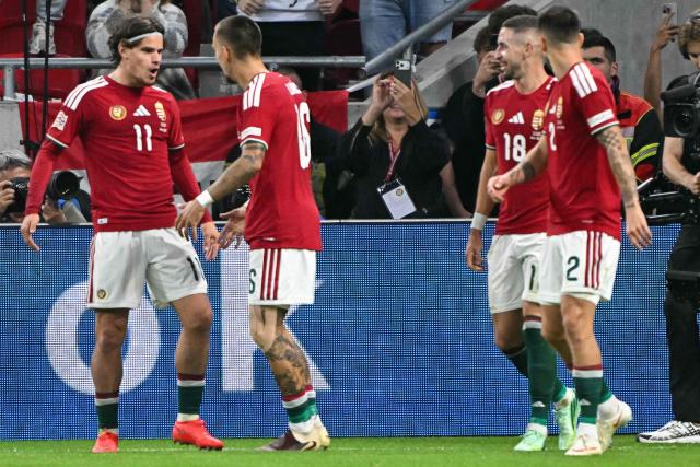 Hungary's midfielder #11 Milos Kerkez (L) celebrates scoring the opening goal with his teammates including Hungary's forward #16 Daniel Lukacs during the UEFA Nations League Group B2 football match between Hungary and Georgia at the Puskas Arena in Budapest, Hungary on October 2, 2026. (Photo by Attila KISBENEDEK / AFP)