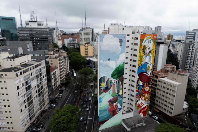 This aerial view shows mural paintings in Sao Paulo, Brazil on October 2, 2026. (Photo by Luis ROBAYO / AFP)