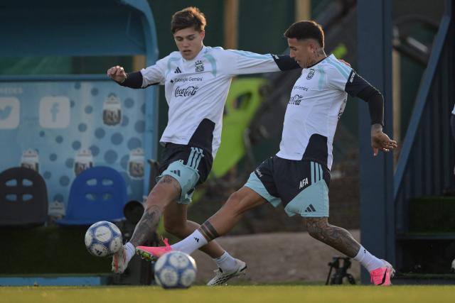 Argentina's defender Tomas Palacios (L) and midfielder Enzo Fernandez fight for the ball during a football training session at the Argentine Football Association (AFA) training camp in Ezeiza, Buenos Aires Province, on October 2, 2026, ahead of the friendly matches against Burkina Faso and Benin. (Photo by JUAN MABROMATA / AFP)