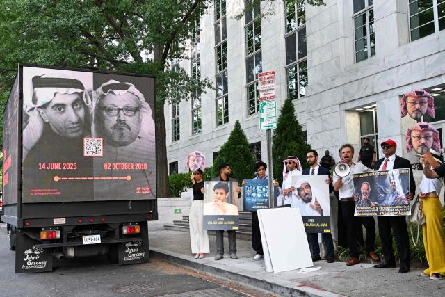 People protest outside the Saudi Arabia Embassy to mark the 8th anniversary of the killing of Saudi journalist Jamal Khashoggi in Washington, DC on October 2, 2026. The organizations Democracy for the Arab World Now (DAWN), founded by Khashoggi, and Arab Rights and Research Center (ARRC) continue calling for accountability in the assasination of the journalist and activist inside the Saudi consulate in Istambul in 2018. (Photo by Alex WROBLEWSKI / AFP)