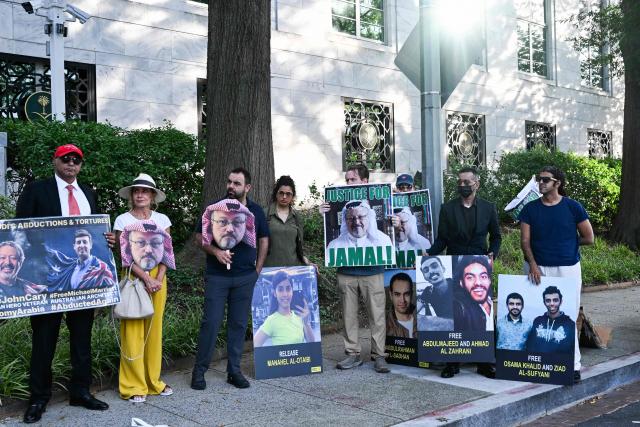 People protest outside the Saudi Arabia Embassy to mark the 8th anniversary of the killing of Saudi journalist Jamal Khashoggi in Washington, DC on October 2, 2026. The organizations Democracy for the Arab World Now (DAWN), founded by Khashoggi, and Arab Rights and Research Center (ARRC) continue calling for accountability in the assasination of the journalist and activist inside the Saudi consulate in Istambul in 2018. (Photo by Alex WROBLEWSKI / AFP)
