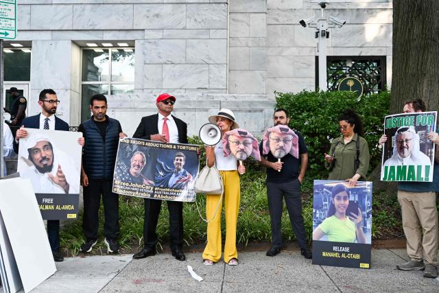 People protest outside the Saudi Arabia Embassy to mark the 8th anniversary of the killing of Saudi journalist Jamal Khashoggi in Washington, DC on October 2, 2026. The organizations Democracy for the Arab World Now (DAWN), founded by Khashoggi, and Arab Rights and Research Center (ARRC) continue calling for accountability in the assasination of the journalist and activist inside the Saudi consulate in Istambul in 2018. (Photo by Alex WROBLEWSKI / AFP)
