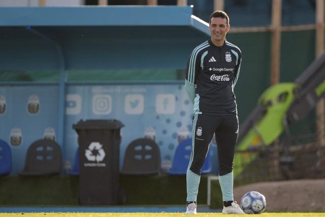 Argentina's football team coach Lionel Scaloni gestures during a football training session as forward Julian Alvarez looks on in the background at the Argentine Football Association (AFA) training camp in Ezeiza, Buenos Aires Province, on October 2, 2026, ahead of the friendly matches against Burkina Faso and Benin. (Photo by JUAN MABROMATA / AFP)