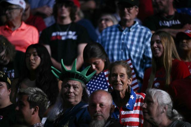 Supporters of US President Donald Trump wait for him to speaks at a midterm campaign rally at The Mitchell Center of the University of South Alabama in Mobile, Alabama on October 2, 2026. (Photo by Brendan SMIALOWSKI / AFP)