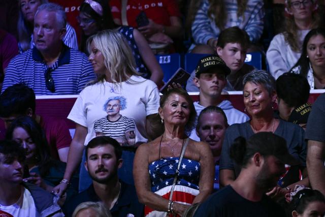 Supporters of US President Donald Trump wait for him to speaks at a midterm campaign rally at The Mitchell Center of the University of South Alabama in Mobile, Alabama on October 2, 2026. (Photo by Brendan SMIALOWSKI / AFP)
